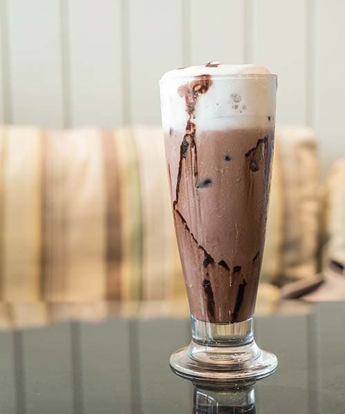 Image Cold Latte with Large Chocolate